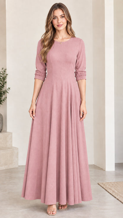 Front view of woman wearing modest dusty pink A-line maxi dress
