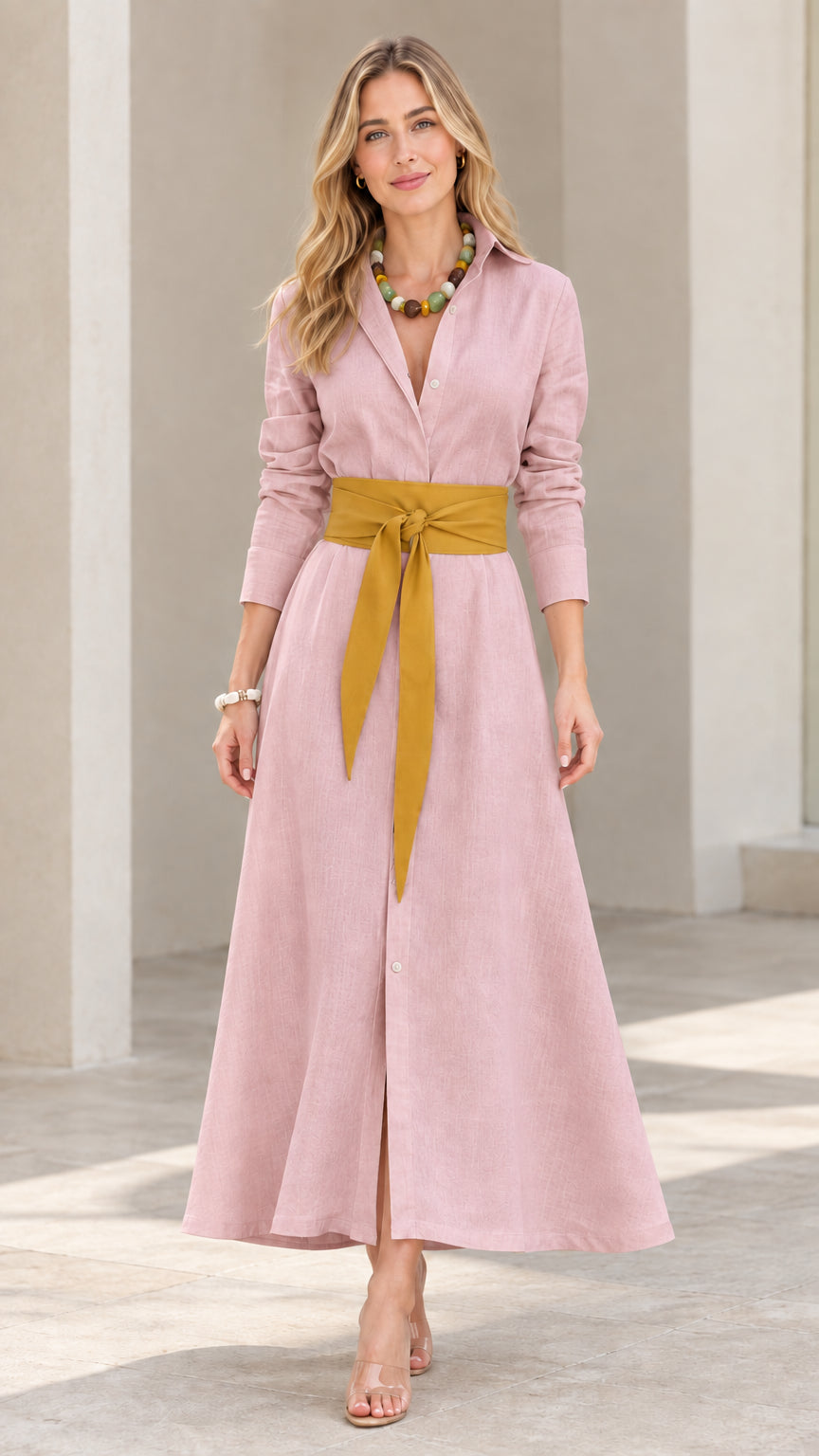 Front view of model wearing dusty pink long sleeve maxi shirt dress with yellow sash belt