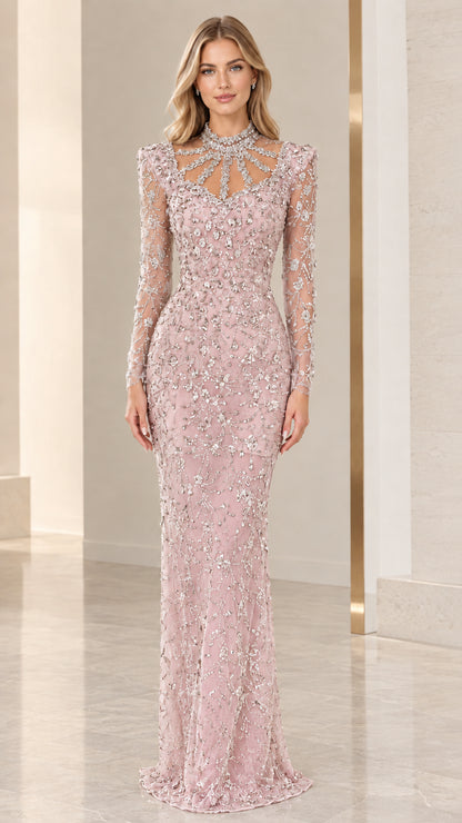 Front view of blush pink long sleeve formal dress with all-over bead embellishments