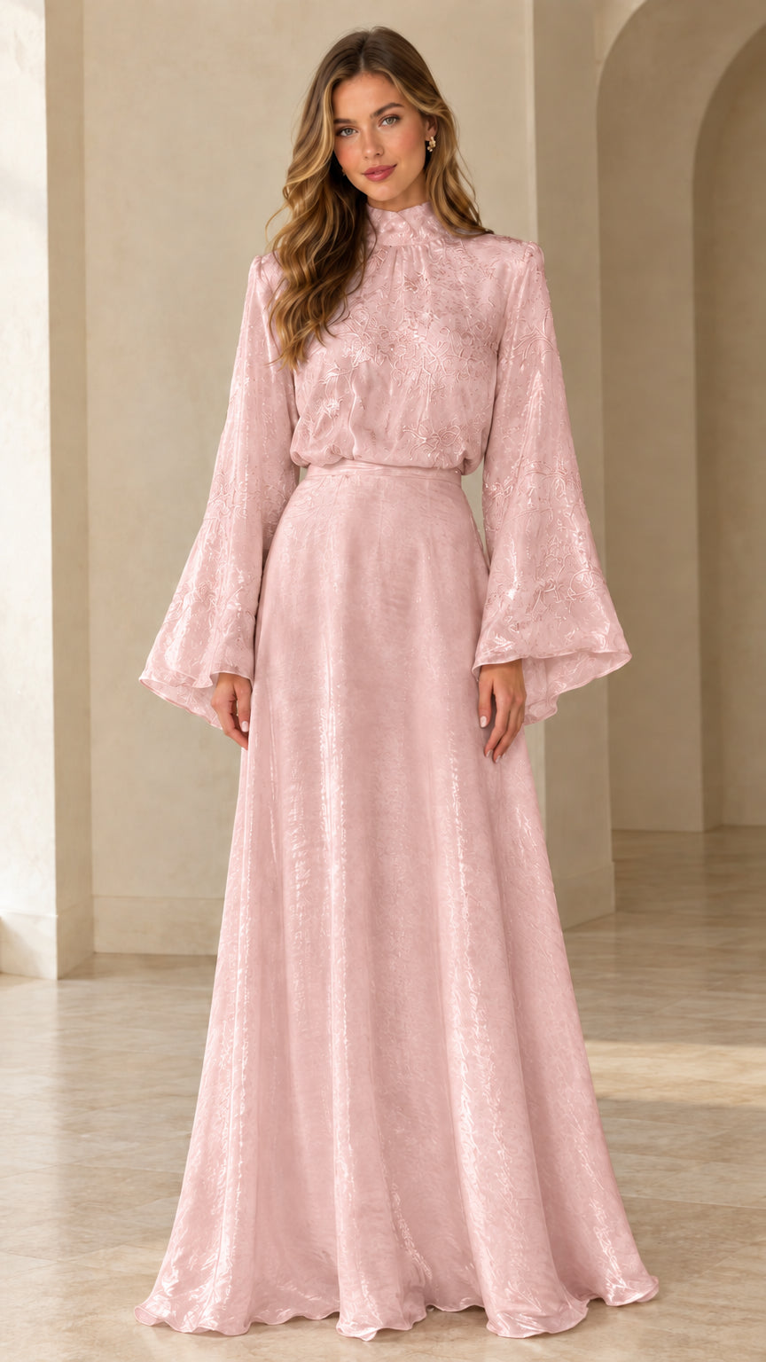 Front full view of woman wearing blush pink high neck flared sleeve maxi dress