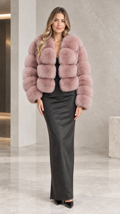 Front view of model wearing the dusty pink plush tiered faux fur jacket