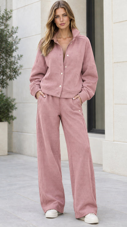 Woman wearing Dusty Pink two-piece snap-front jacket and wide-leg pants set