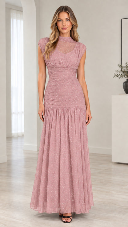 Front full-length view of model wearing dusty pink sparkle mesh ruched evening gown