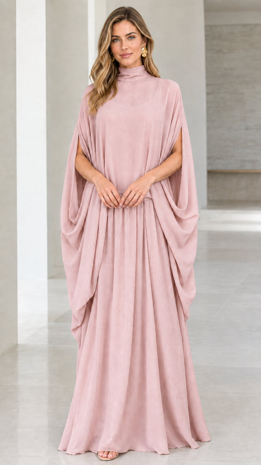 Front view of model wearing dusty pink high neck cape sleeve maxi dress