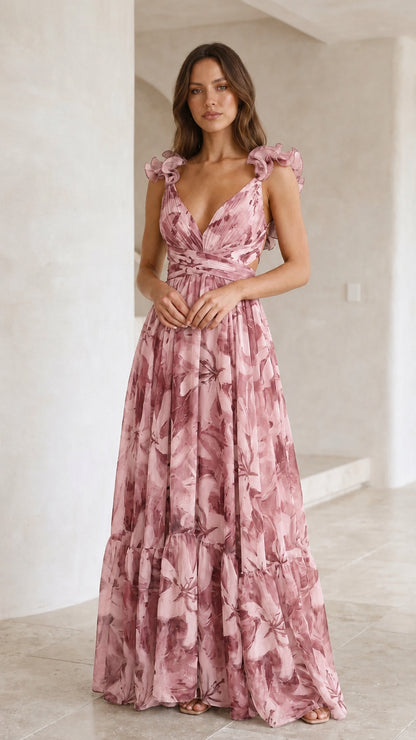 Front view of woman wearing blush pink floral print chiffon maxi dress