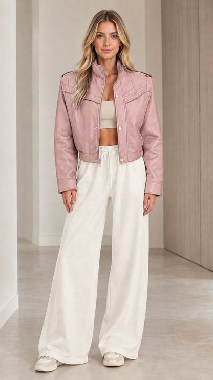 Front full view of woman wearing the cropped faux leather jacket in Dusty Pink