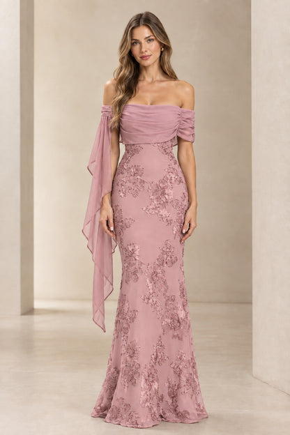 Model wearing dusty rose pink off-the-shoulder embroidered lace evening maxi dress