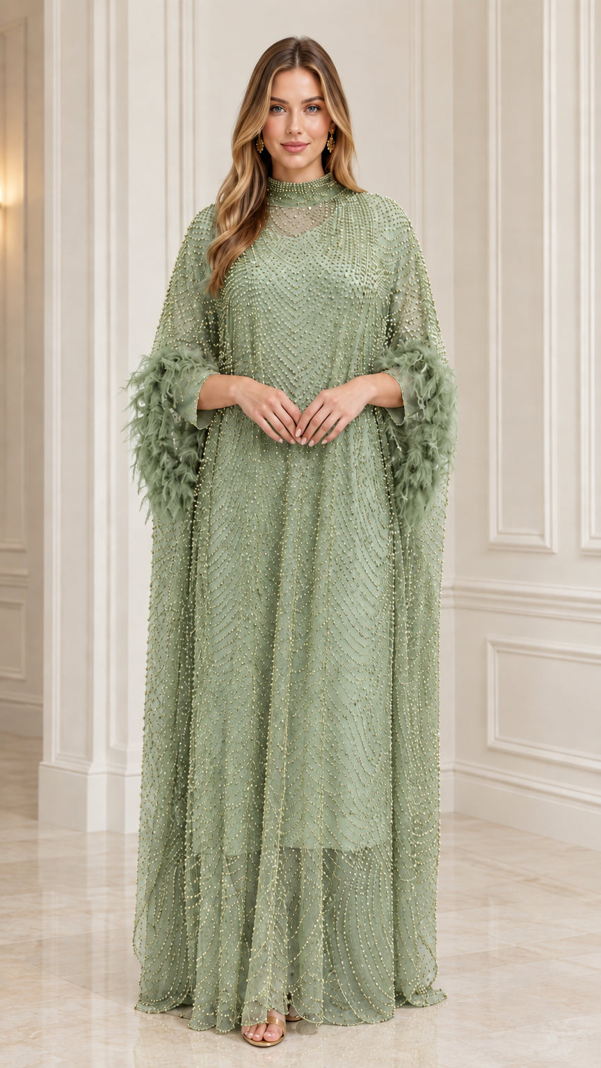 Model wearing Sage Green beaded kaftan evening gown with feather sleeves