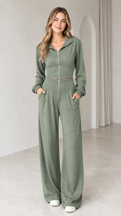 Front view of woman wearing sage green zip-front collared two-piece tracksuit set