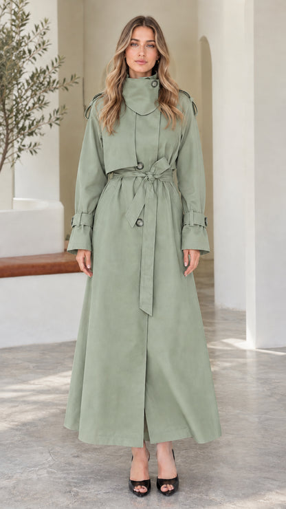 Front view of model wearing Sage Green high-neck maxi belted trench coat