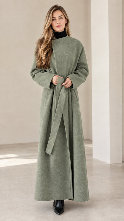 Model wearing sage green long wrap coat with stand collar
