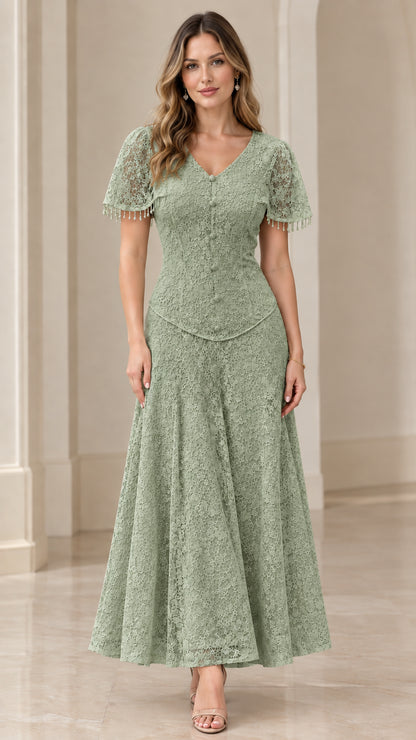 Front view of model in sage green floral lace V-neck maxi dress