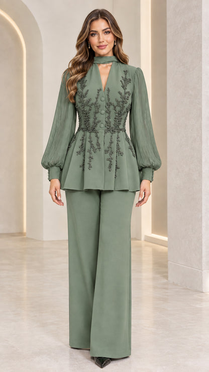 Full front view of sage green beaded peplum trouser suit