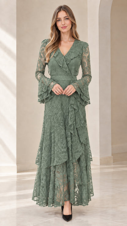 Front full view of woman wearing sage green tiered lace evening gown