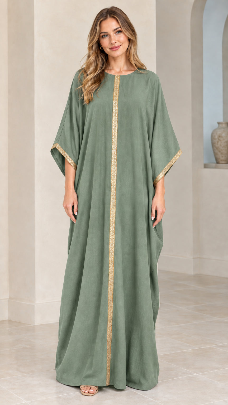 Full front view of model wearing sage green kaftan maxi dress with gold trim