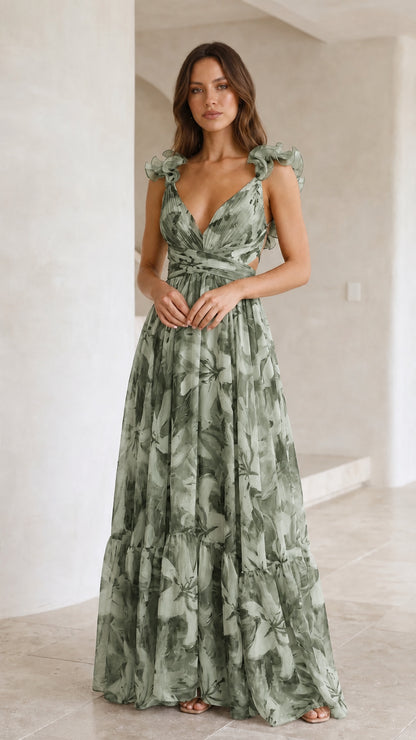 Front view of woman wearing sage green floral print maxi dress
