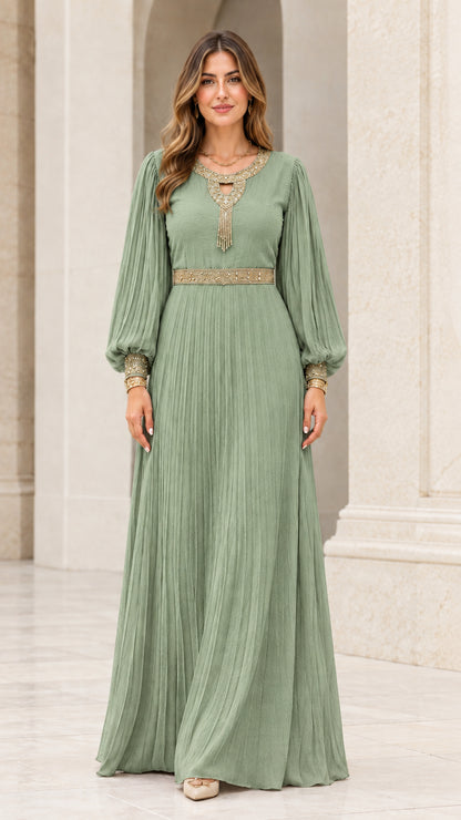 Front view of sage green pleated long sleeve maxi gown with gold trim