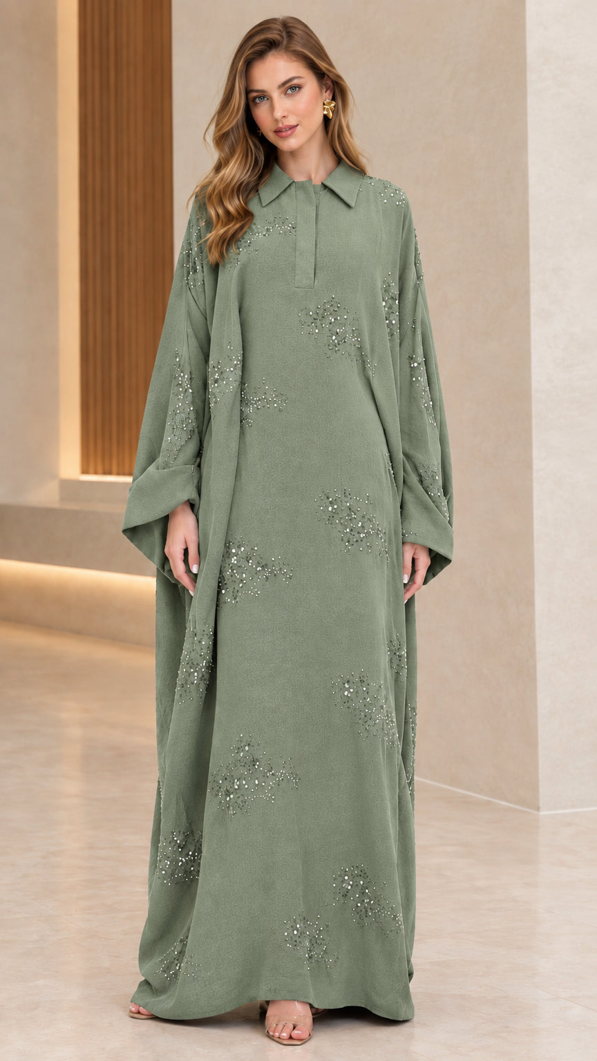 Front full-length view of woman wearing sage green collared sequin embellished abaya maxi dress