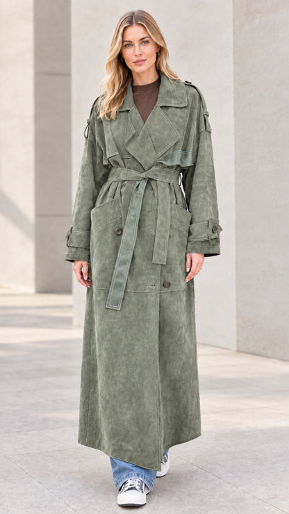 Front view of model wearing sage green maxi suede-finish trench coat