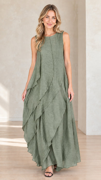 Model wearing sage green sleeveless tiered flowy maxi dress