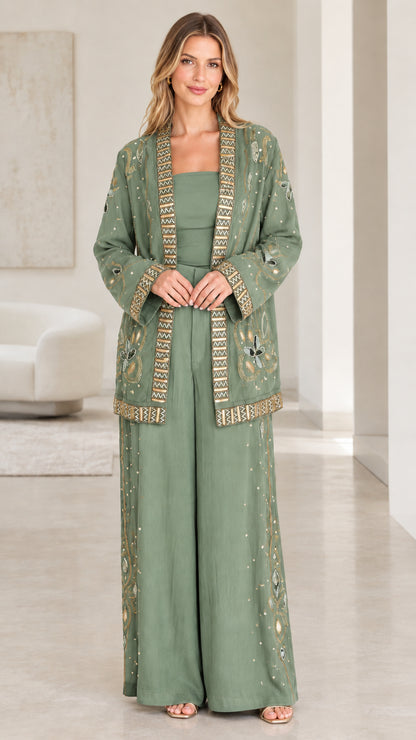 Front full-length view of sage green embroidered evening jacket and wide-leg trouser set