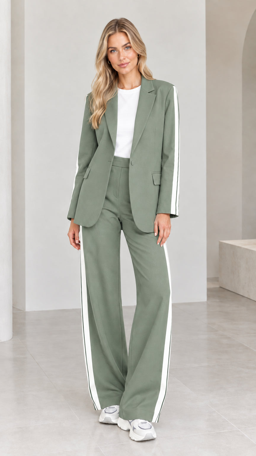 Model wearing sage green 2-piece blazer and wide-leg pants suit set with white side stripes