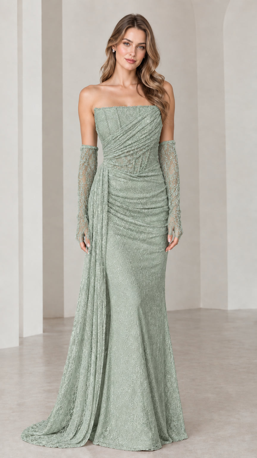 Model wearing sage green strapless ruched lace formal gown with matching gloves