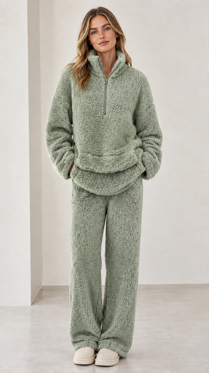 Model wearing sage green sherpa fleece quarter-zip loungewear set