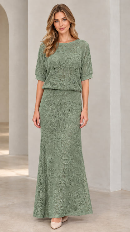 Front view of woman wearing sage green crochet knit blouson maxi dress