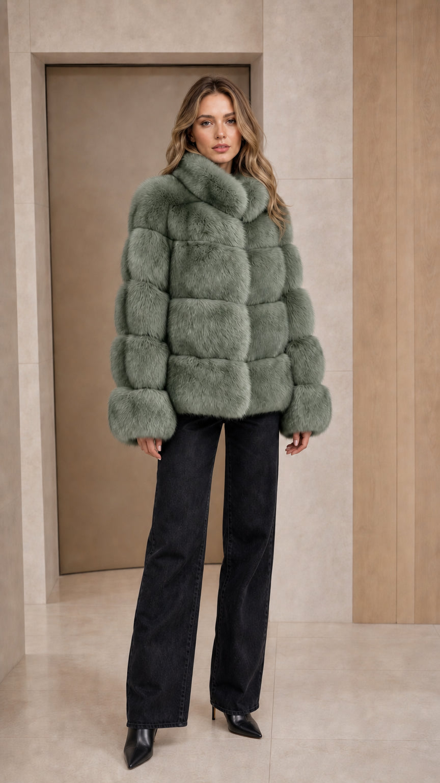 Model wearing sage green plush faux fur paneled jacket
