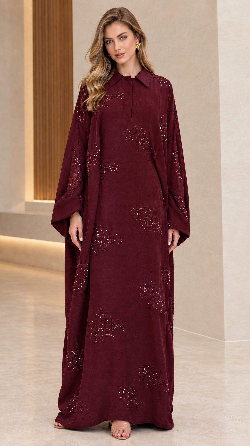 Front full-length view of woman wearing burgundy wine collared sequin embellished abaya maxi dress
