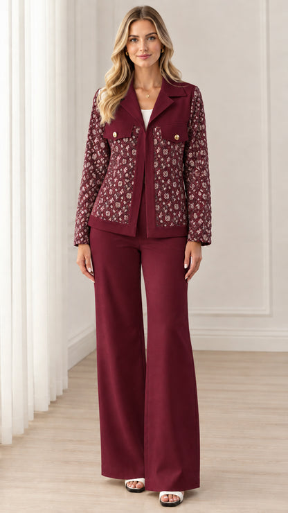 Full view of women's burgundy two-piece tailored blazer and trousers set