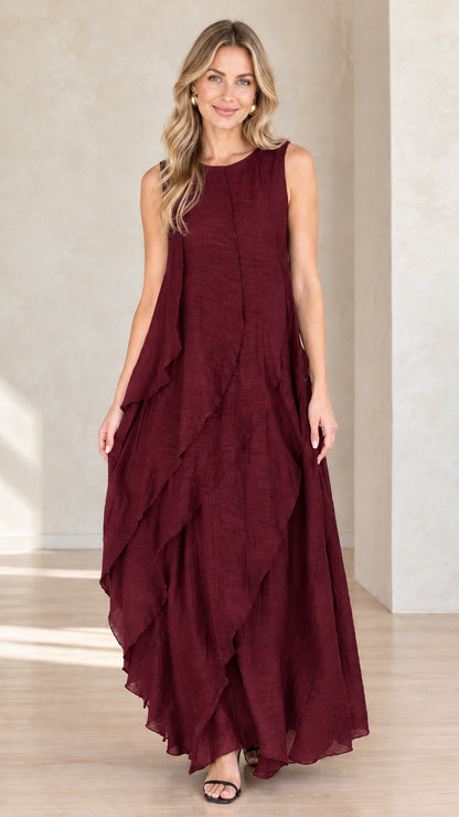 Model wearing burgundy wine red sleeveless tiered maxi dress