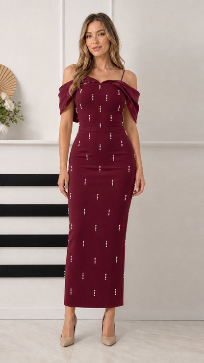 Front view of burgundy red pearl-embellished off-the-shoulder column formal dress