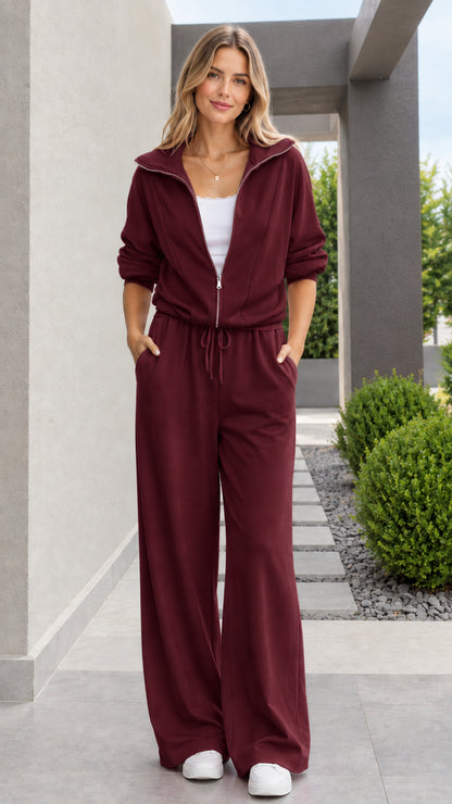 Front view of model wearing burgundy wine zip-up wide leg tracksuit set