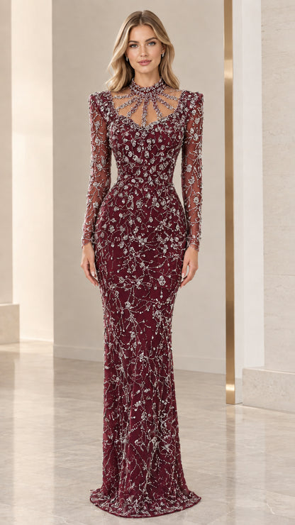 Front view of burgundy red long sleeve beaded formal gown