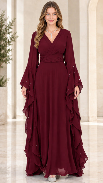 Front view of woman wearing Burgundy wine V-neck chiffon maxi evening dress with bell sleeves