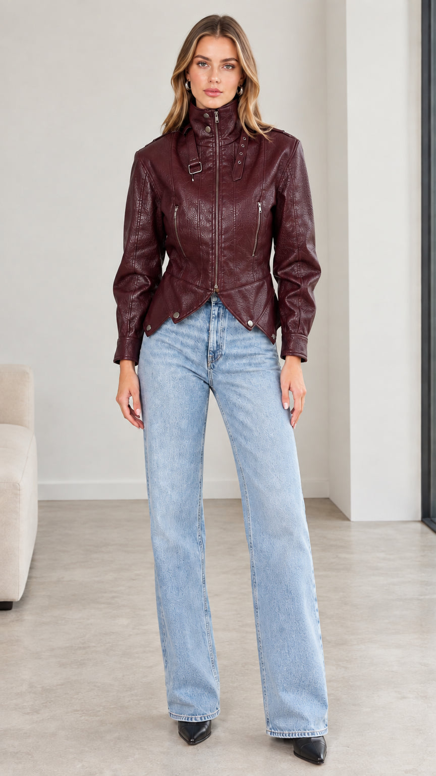 Front view of model wearing burgundy wine faux leather moto jacket