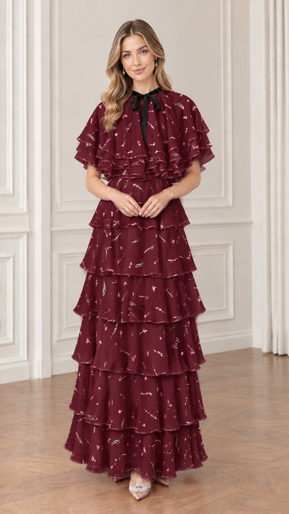 Burgundy floral tiered chiffon maxi dress with flutter capelet