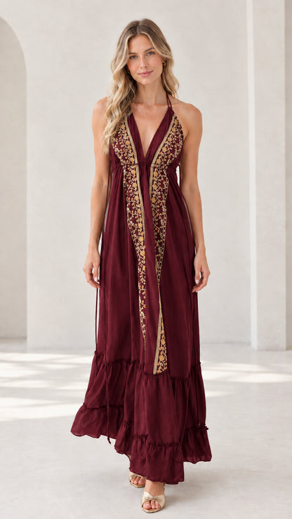 Model wearing burgundy wine red embroidered halter maxi dress