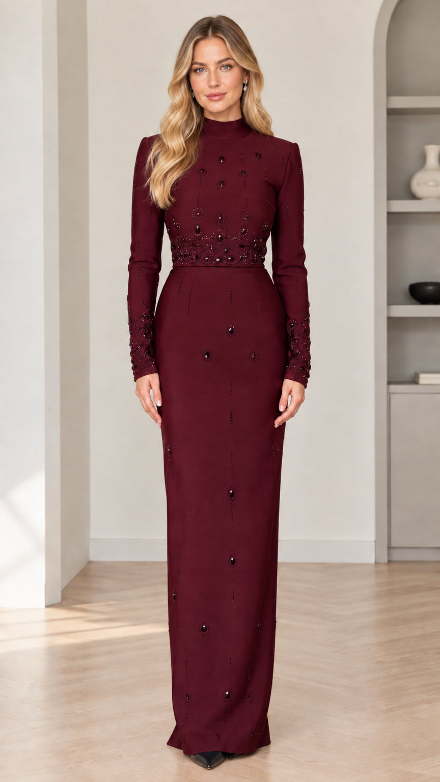 Front view of model wearing burgundy wine red mock neck long sleeve beaded maxi evening dress