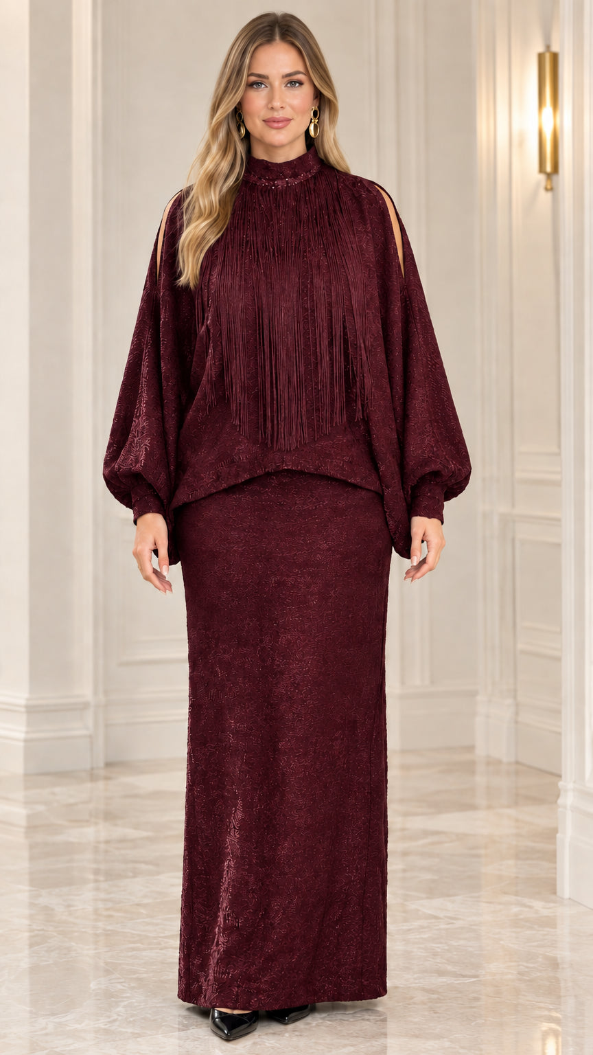 Front view of model wearing burgundy wine fringe mock neck two-piece maxi dress set