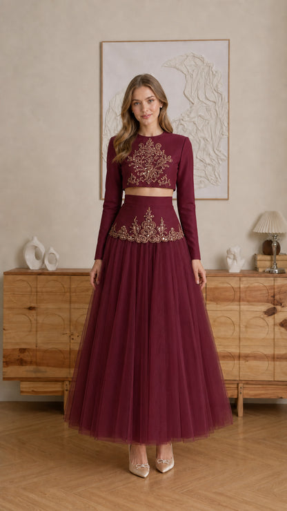 Model wearing Burgundy red embroidered long-sleeve crop top and tulle maxi skirt set - front view
