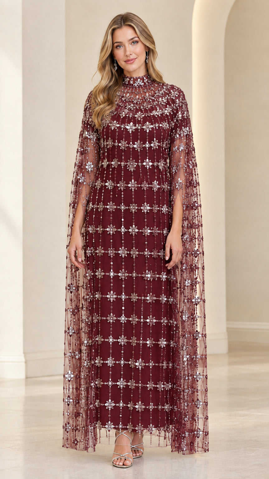 Front view of model in Burgundy wine crystal-beaded formal cape gown