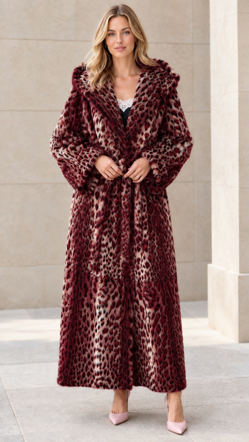 Full-length view of model wearing burgundy red leopard print hooded faux fur maxi coat