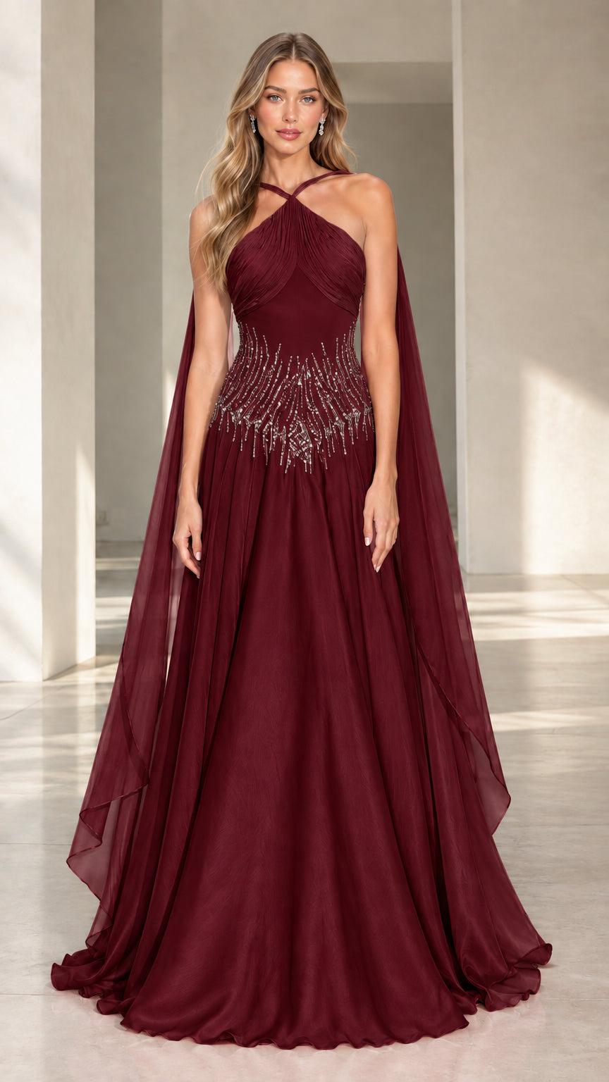 Front view of burgundy halter neck maxi formal gown with beaded midriff