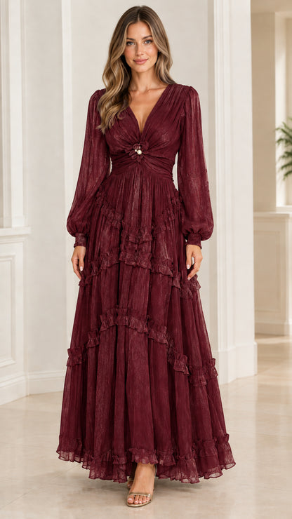 Model wearing burgundy wine tiered plissé maxi dress with V-neckline