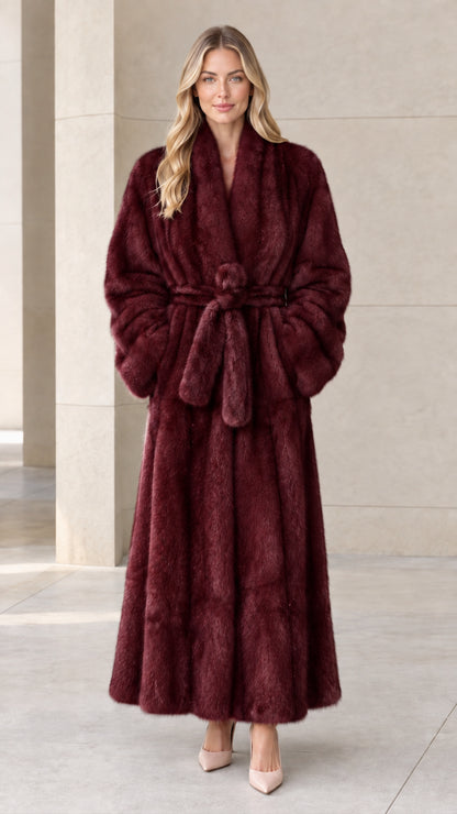 Front view of woman wearing burgundy wine full-length plush wrap coat