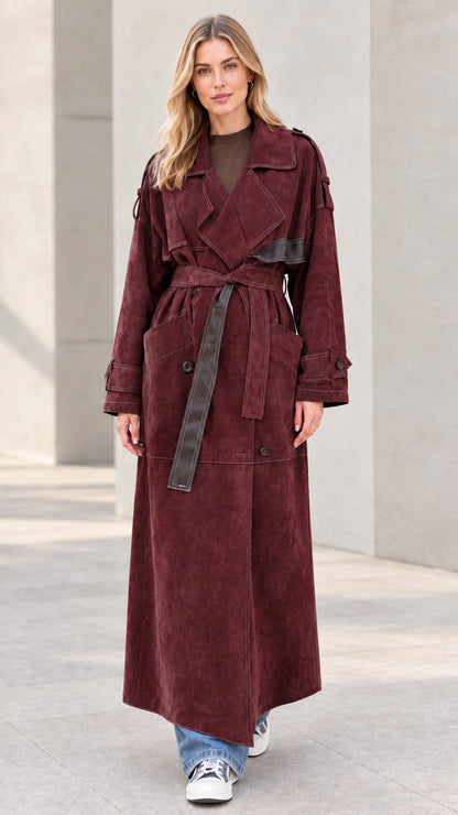 Front view of model wearing burgundy wine maxi suede-finish trench coat