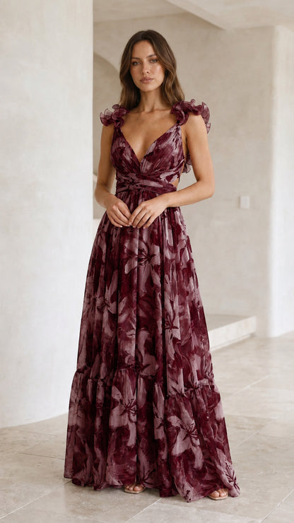 Front view of woman wearing deep burgundy wine floral print maxi dress